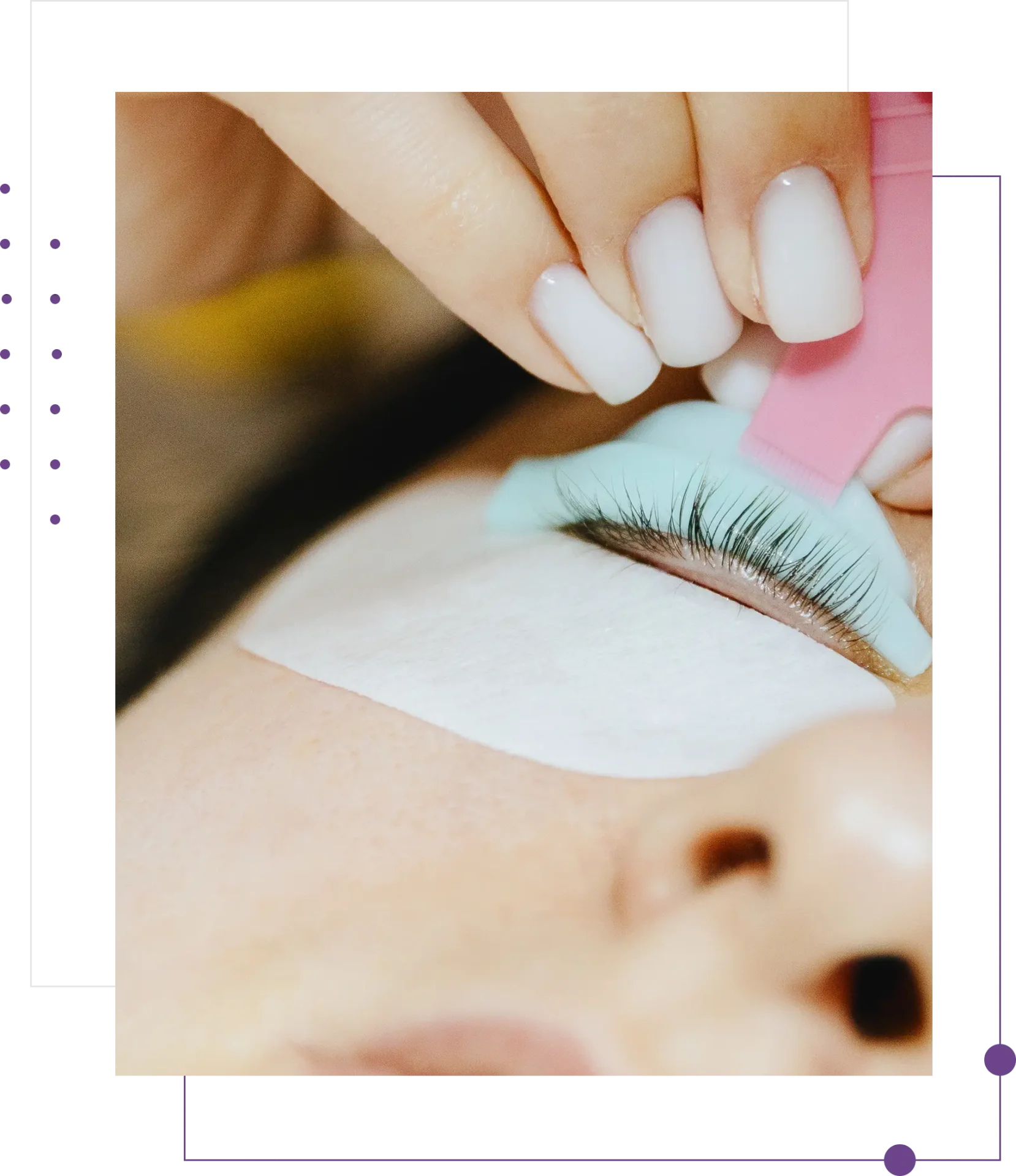 Applying false eyelashes with precision tool.